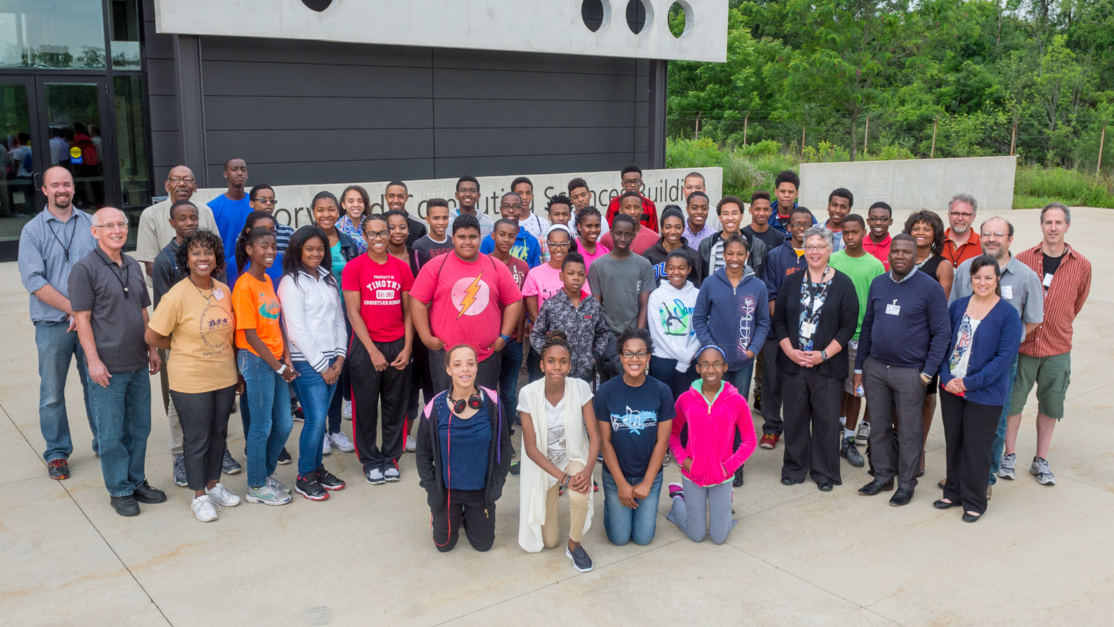 The group that attended this summer’s coding camp posed with their teachers and camp organizers. 