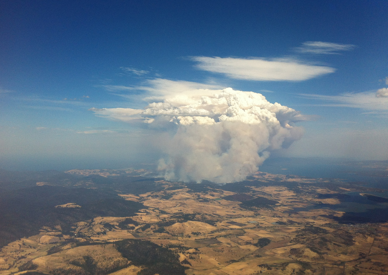 Fires in Tasmania visible from the air during Australia’s “angry summer.”