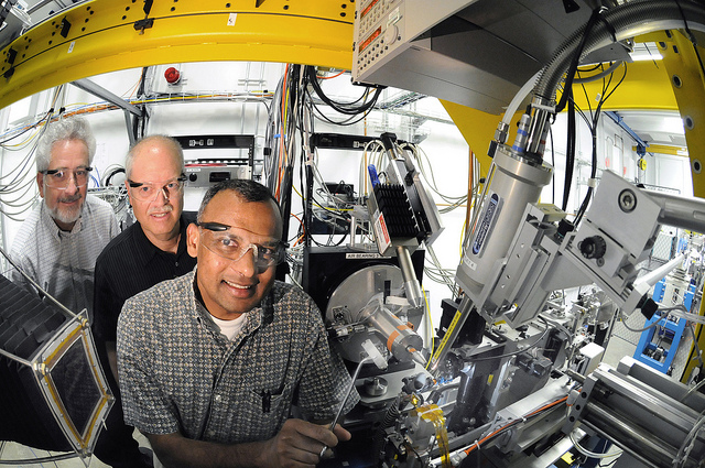 Robert Fischetti (left), Glen Nemerow (center) and Vijay Reddy load samples at the Advanced Photon Source.