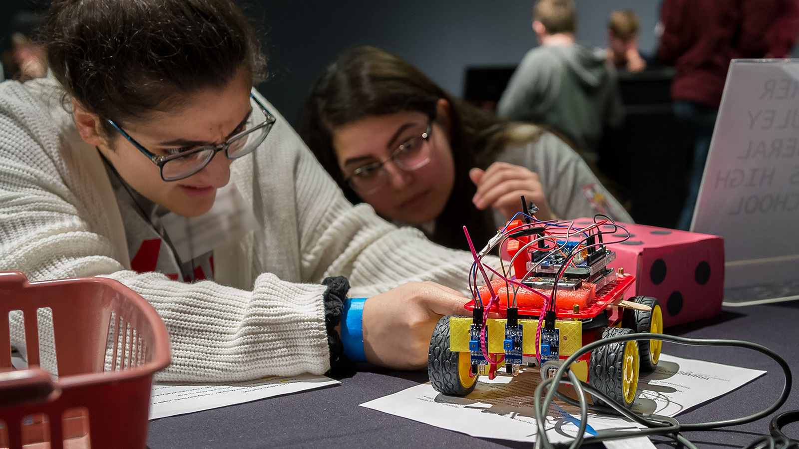 Students from Mother McAuley hurried to make last-minute tweaks to their autonomous vehicle before testing began. (Image by Argonne National Laboratory / Mark Lopez.)