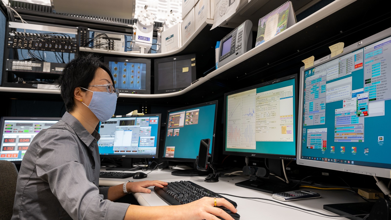 Beamline scientist Tianpin Wu in the control room of beamline 9-BM of the Advanced Photon Source. This beamline is one of the few capable of in situ experiments, and Wu helps visiting scientists design their experiments and collect data. (Image by Mark Lopez / Argonne National Laboratory.)