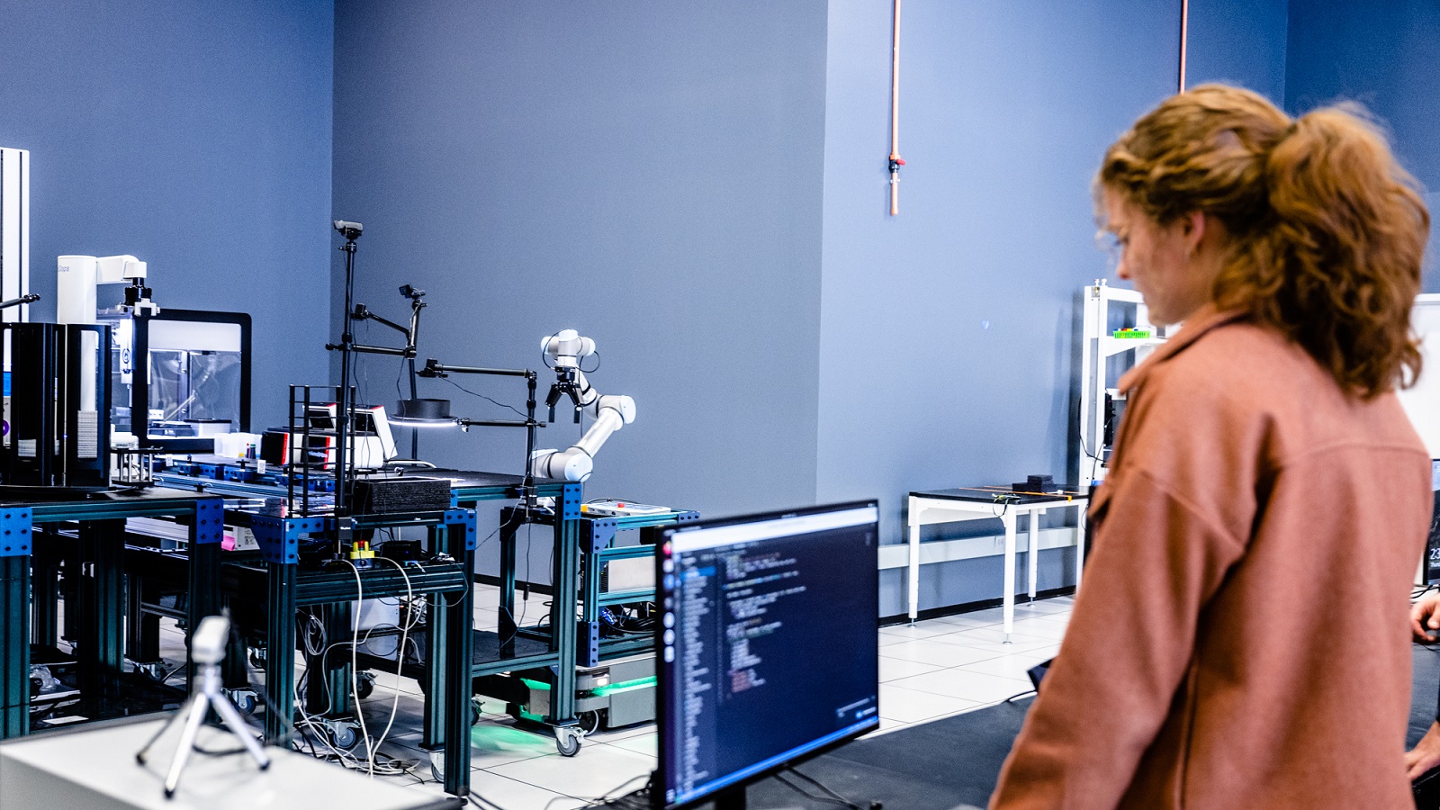 The Rapid Prototyping Lab is a proving ground for the robots researchers will use in automated labs. Casey Stone is one of the researchers figuring out how to incorporate new technology into biology and chemistry experiments.