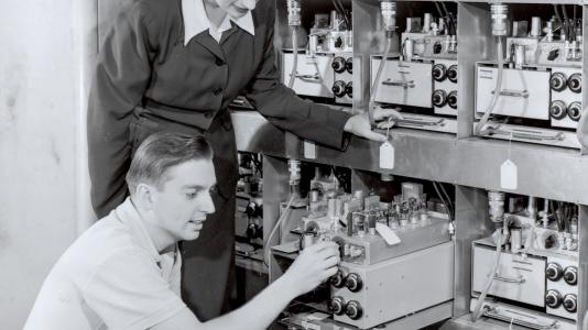 Margaret Butler helps assemble the ORACLE computer with Oak Ridge National Laboratory Engineer Rudolph Klein. In 1953, ORACLE was the world’s fastest computer, multiplying 12-digit numbers in .0005 seconds. Designed at Argonne, it was constructed at Oak Ridge.