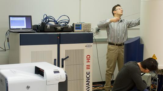Baris Key, assistant chemist and Hao Wang, postdoctoral researcher prepare an experiment in Argonne’s Nuclear Magnetic Resonance (NMR) laboratory.