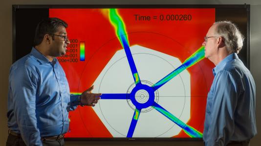 Argonne researchers Sibendu Som and Raymond Bair review fuel spray simulations at the Argonne Leadership Computing Facility. Som and Bair were honored for their work by the Federal Laboratory Consortium.