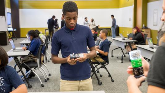 A student from from Chicago's Laura S. Ward STEM School learning to use computational thinking.