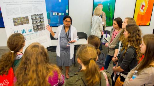 Argonne postdoctoral fellow Shalaka Desai explains her research to Chicago-area high school girls visiting Argonne as part of Science Careers in Search of Women, an annual one-day Science conference to explore careers in science, technology, engineering and math.