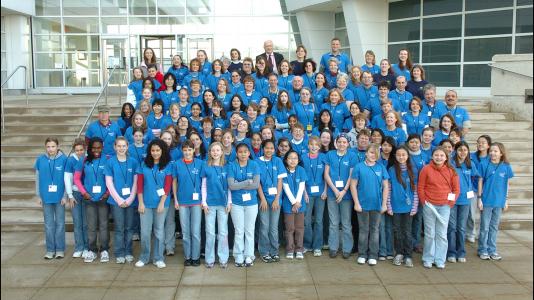 As a middle-schooler, Mia Cochrane (at right, in orange) attended a 2007 Argonne workshop that pairs students with women engineers and scientists.
