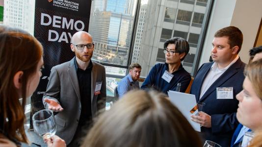 Entrepreneur Justin Nussbaum, CEO of Ascend Manufacturing, discusses his advanced 3D printing process at Argonne’s Demo Day, a showcase of laboratory-embedded innovators. (Image by Argonne National Laboratory.)
