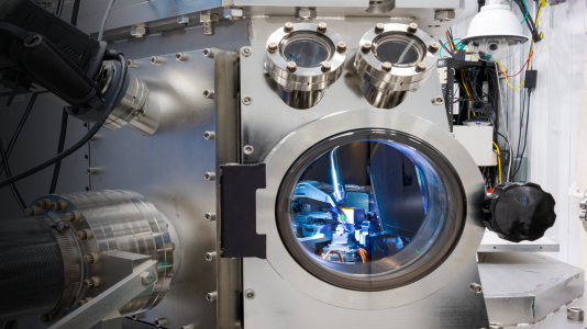 Looking into the hard X-ray nanoprobe synchrotron chamber while measuring a response of an individual cuprous oxide particle to the exposure of carbon dioxide, water and light. (Image by Tijana Rajh / Argonne National Laboratory.)