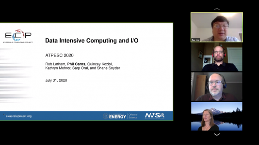 Ray Loy (Argonne), Rob Latham (Argonne), Phil Carns (Argonne) and Kathryn Mohror (Lawrence Livermore National Laboratory) kick off a day of training on data-intensive computing and I/O. (Image by Argonne National Laboratory.)