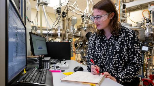 Katie Sautter is a postdoctoral researcher in Supratik Guha's lab at Argonne National Laboratory. She builds materials for quantum devices using a molecular beam epitaxy machine. (Image by Argonne National Laboratory.)
