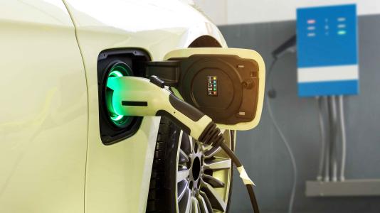 Electric car charging. (Image by Smile Fight/Shutterstock.)