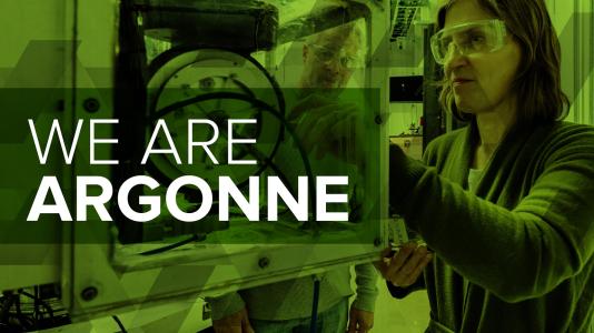 Green-hued image of workers with goggles using scientific equipment. (Image by Argonne National Laboratory.)