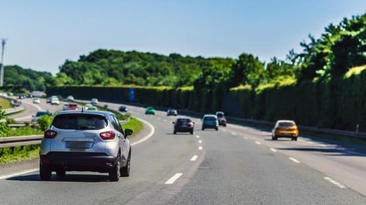 Cars on highlway. (Image by Shutterstock/Cars Roads Travels.)