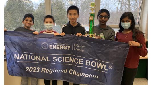 Students from Daniel Wright Junior High School celebrate winning the 2023 Illinois Regional Middle School Science Bowl.