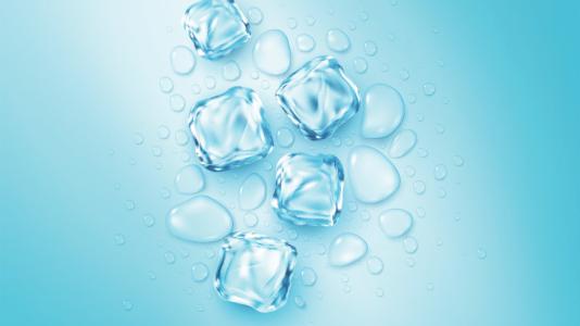 Ice cubes and water droplets on a blue backdrop.